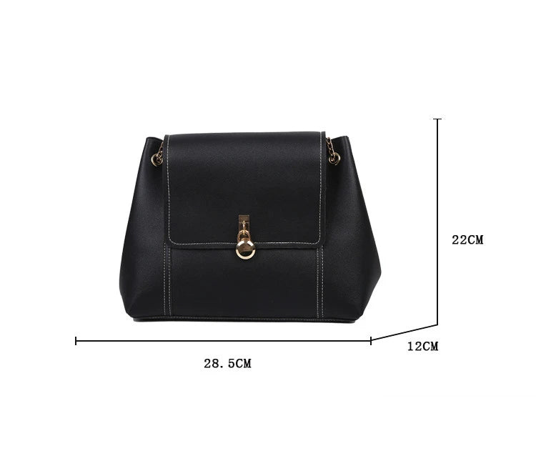 Black leather backpack with gold hardware, measuring 28.5 cm wide and 12 cm tall.