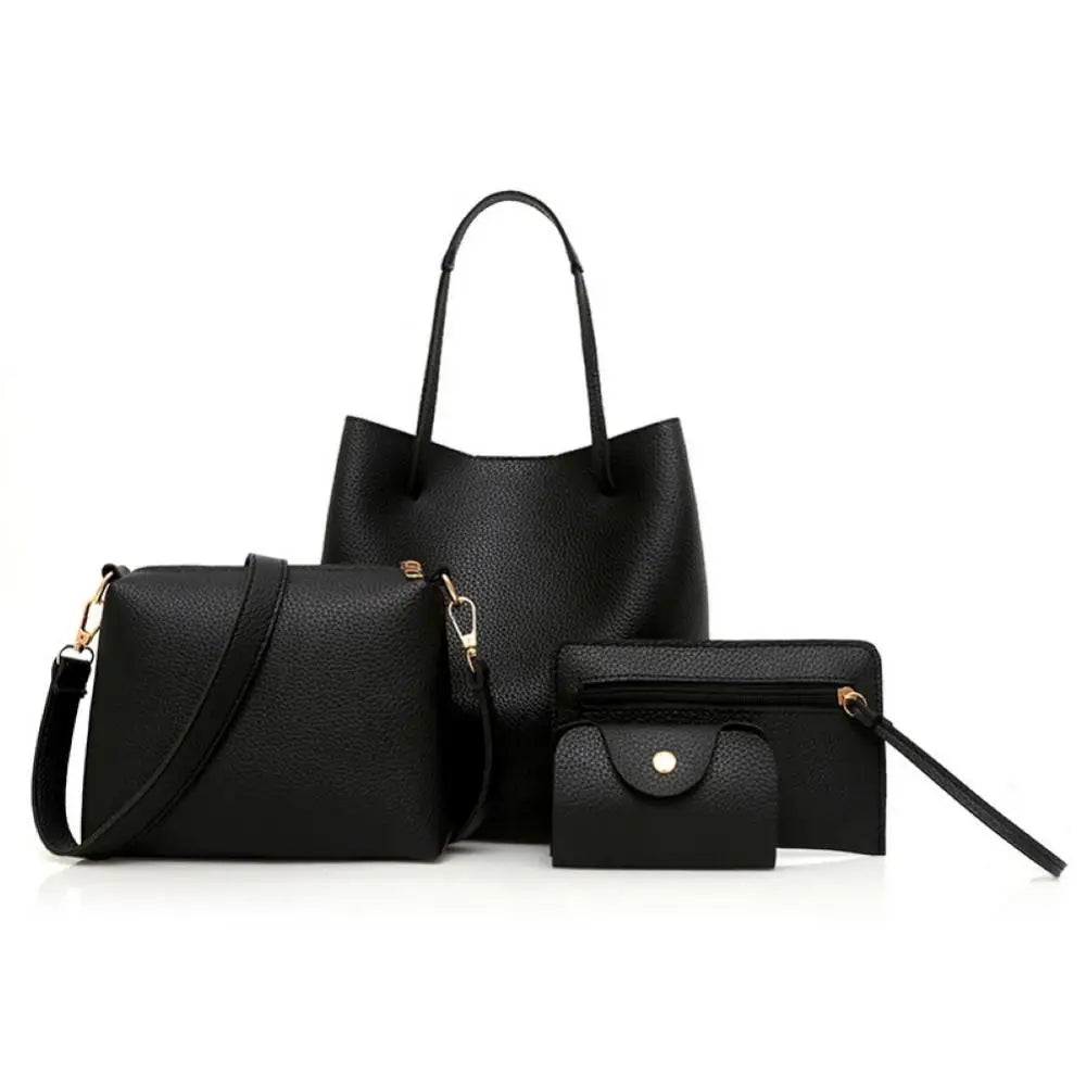 Black leather tote bag set with matching wallet and pouch on white background.