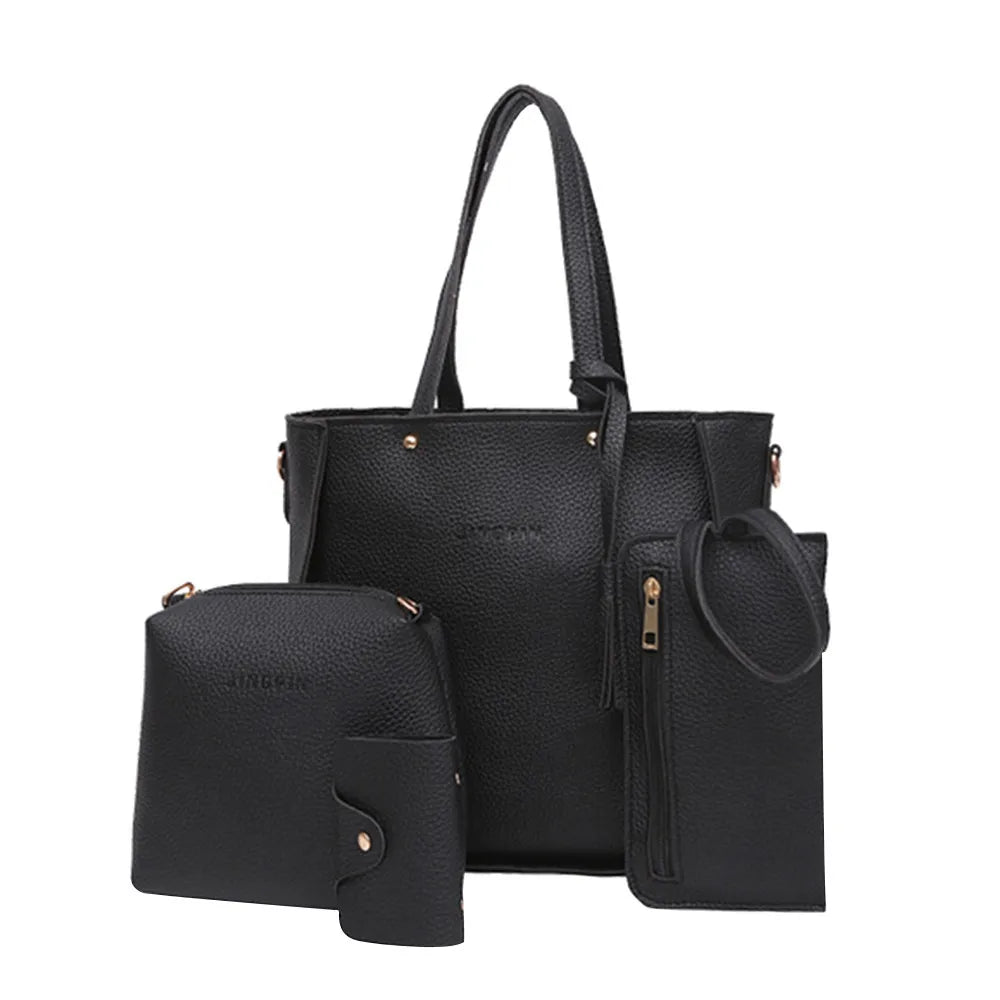 Black leather tote bag set with matching pouches and gold zippers.