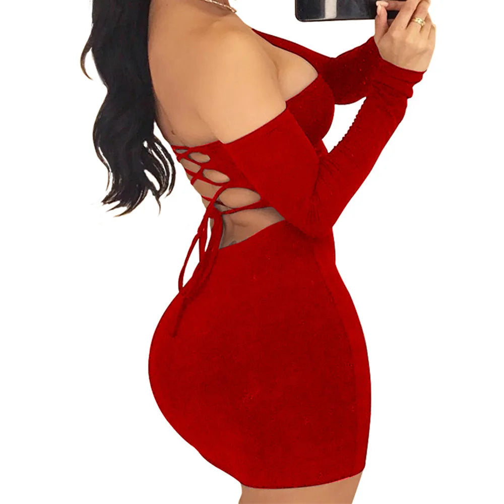 Red long-sleeve dress with cut-out back and lace-up detail.